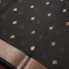 Black Soft Silk Cotton Saree with Golden Zari Buttas and Border Black silk cotton saree with golden zari buttas and geometric zari border