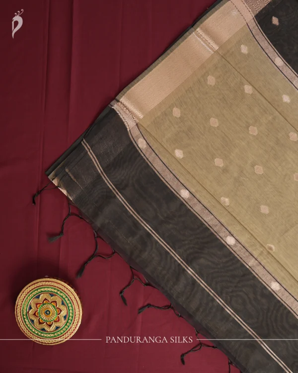 Black Soft Silk Cotton Saree with Golden Zari Buttas and Border Black silk cotton saree with golden zari buttas and geometric zari border