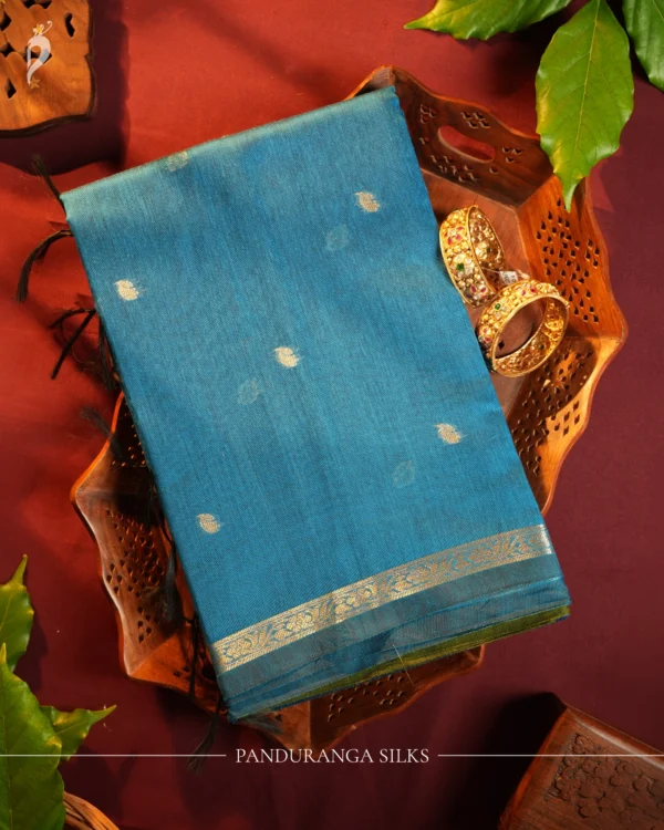 Blue Soft Silk Cotton Saree with Golden Zari Buttas and Leaf Green Blue silk cotton saree with golden zari buttas and leaf green pallu