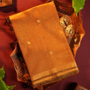 Mustard gold silk cotton saree with golden zari buttas and detailed golden border
