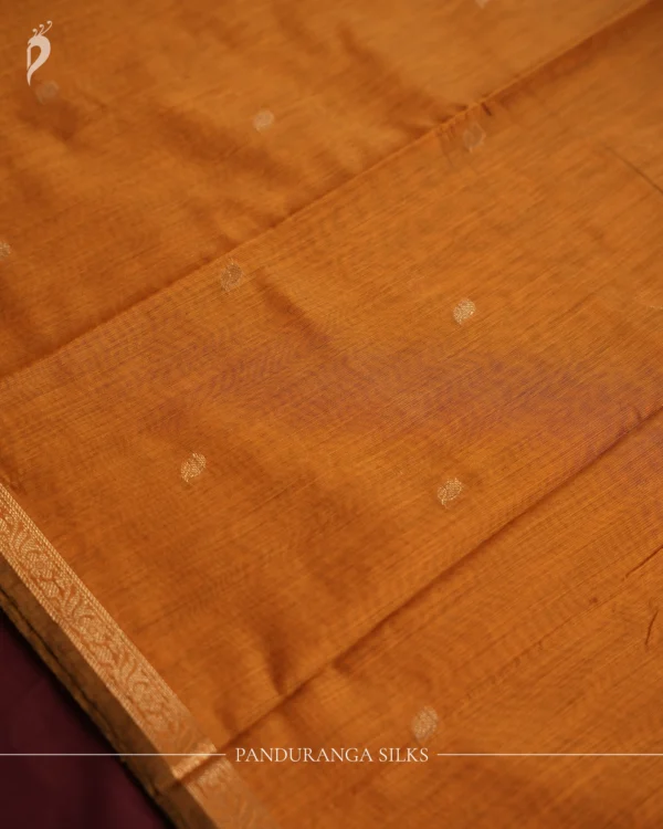 Mustard Gold Soft Silk Cotton Saree with Golden Zari Buttas Design Mustard gold silk cotton saree with golden zari buttas and detailed golden border