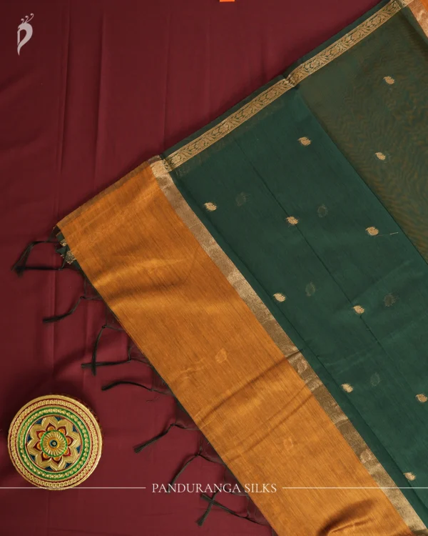 Mustard Gold Soft Silk Cotton Saree with Golden Zari Buttas Design Mustard gold silk cotton saree with golden zari buttas and detailed golden border