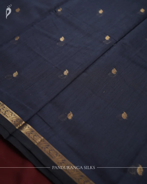Dark Navy Blue Soft Silk Cotton Saree with Golden Zari Buttas Dark navy blue silk cotton saree with golden zari buttas and zari border
