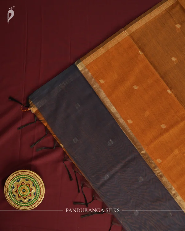 Dark Navy Blue Soft Silk Cotton Saree with Golden Zari Buttas Dark navy blue silk cotton saree with golden zari buttas and zari border