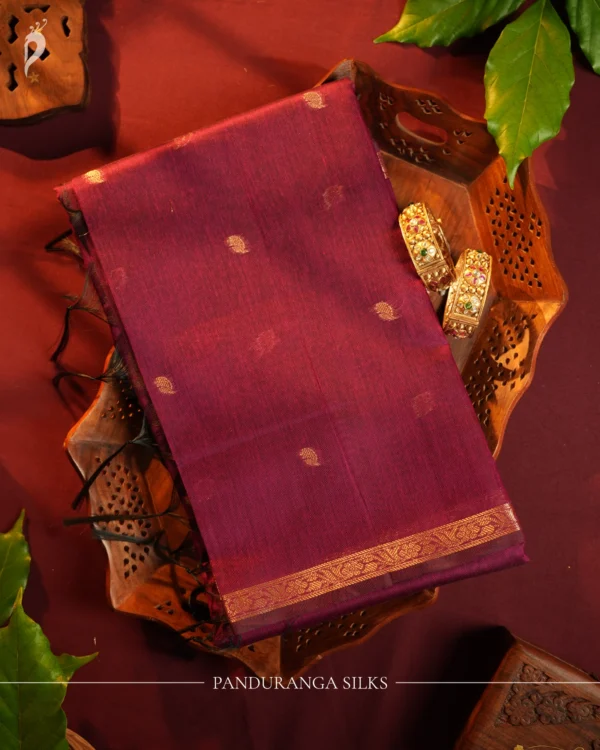 Rani Purple Soft Silk Cotton Saree with Golden Zari Buttas Design Rani purple silk cotton saree with golden zari buttas and brown zari border