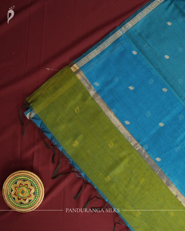 Leaf Green Soft Silk Cotton Saree with Golden Zari Buttas Design Leaf green silk cotton saree with golden zari buttas and golden zari border