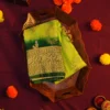 Green Georgette Silk Saree with Floral Buttas and Golden Zari Border Green georgette silk saree with floral zari buttas, golden zari border, floral motifs and tassel pallu