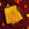 Lemon yellow georgette silk saree with floral zari buttas, golden zari border, floral motifs and tassel pallu