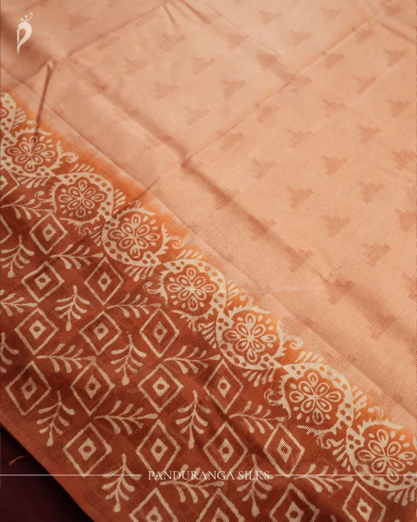 Blush Peach Tussar Silk Saree with Embossed Geometric Design Blush peach Tussar silk saree with embossed geometric design and terracotta floral border