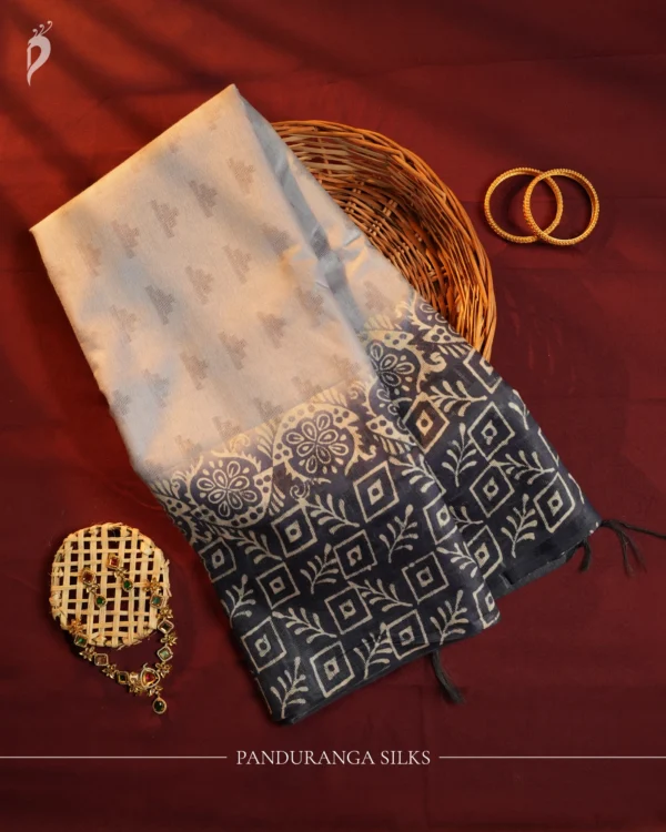 Navy Blue Tussar Silk Saree with Embossed Geometric Design Work Navy blue Tussar silk saree with embossed geometric design and floral geometric border