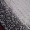 Navy Blue Tussar Silk Saree with Embossed Geometric Design Work Navy blue Tussar silk saree with embossed geometric design and floral geometric border