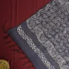 Navy Blue Tussar Silk Saree with Embossed Geometric Design Work Navy blue Tussar silk saree with embossed geometric design and floral geometric border
