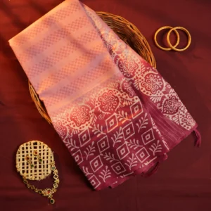 Magenta pink Tussar silk saree with embossed geometric design and floral patterned border