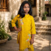 Mustard yellow girls' kurti set with colourful embroidered motifs on the kurti and pants. Mustard yellow girls' kurti set with colourful embroidered motifs on the kurti and pants.