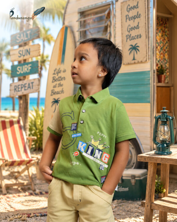 Olive green T-shirt for boys and beige shorts set Olive green T-shirt for boys and beige shorts set with colourful graphic prints and a collared shirt.